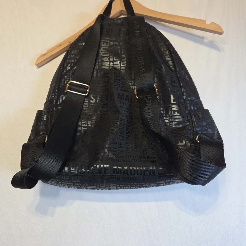 Steve Madden Black Logo Print Backpack Gold Tone Zippers Large Book Travel Bag